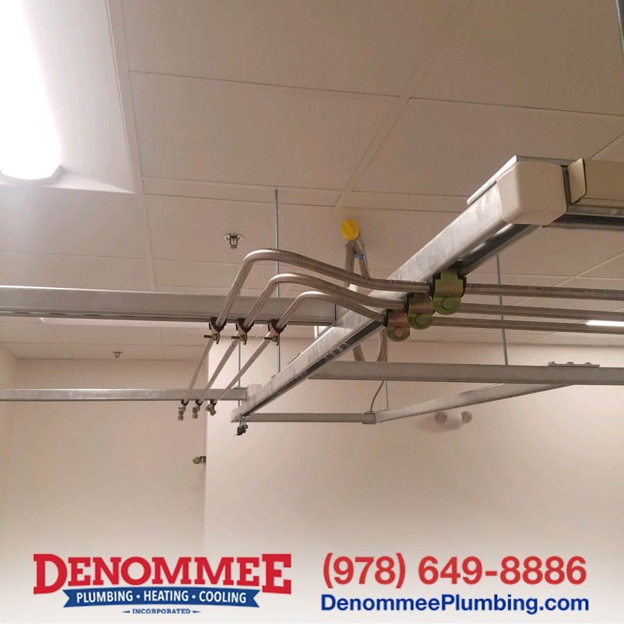 Overhead pipping installed in Lowell, MA by Denommee Plumbing, Heating & Cooling, Inc